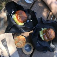 unchicken burger with coleslaw salad  at UNMEAT in Zurich