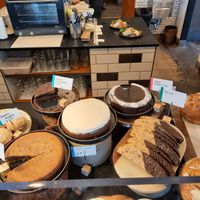 Selection of baked goods, including vegan cinnamon rolls, ginger cake, chocolate cake, carrot cake and more. at PublicUs in Las Vegas