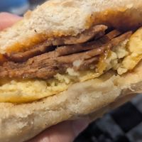 "The Superior" breakfast sandwich with just egg, vegan cheddar and ham from grass fed at Tree Town Cafe in Penfield