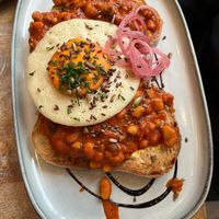 beans on toast w/ vegan “egg"  at The Vibe in Liverpool