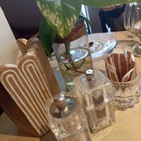 A plant and condiment dispensers at The Vibe in Liverpool