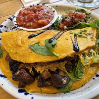Mushroom, broccoli & cheese omelette with homemade baked beans. Delicious! at The Vibe in Liverpool