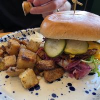 Burger and cubed potatoes. at The Vibe in Liverpool
