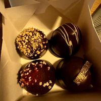 Flødebollers before the plane trip smooshed them  at Glean - Torvehallerne in Copenhagen