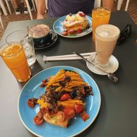 Vegan toast and an iced soya chai latte on the first day. The second time we went we had the chutney for the toast as well and it tasted a bit better! at Chelsea Coffee & Brunch in Faro