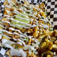Pollo nachos - so good   at Tacos Veganos in Phoenix