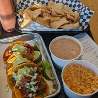 4 tacos, rice, beans, and chips at Tacos Veganos in Phoenix