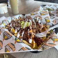 Loaded fries!  No onion  at Tacos Veganos in Phoenix