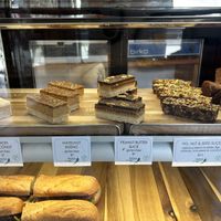 Pastry cabinet with slices  at Swallow Coffee Traders in Rockdale