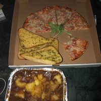 Vegan garlic bread, vegan ‘magi’ pizza and vegan lentil pot pie takeaway all delicious! at Wallace Hotel in Wallace