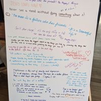 Whiteboard with affirming messages at The Little Poet in Hobart