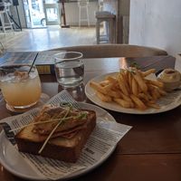 Egg and bacon toast, truffle fries and housemade soda (all vegan) at The Little Poet in Hobart