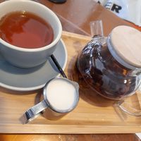 Pot of Ruby Black tea with almond milk at The Little Poet in Hobart