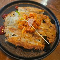Pan fried dumplings with kimchi at The Little Poet in Hobart