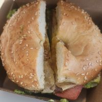 Vegan bacon and vegan egg bagel with avocado at The Little Poet in Hobart