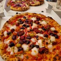 Pizza amore and pizza calabria at Mastino Pizza in Amsterdam