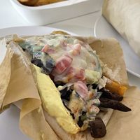 The special gyros with the secret sauce. I won’t tell you what it is, it is a secret...  at Cookoomela Lab - Kalliga in Athens