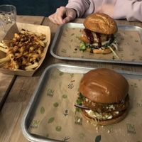 Satay burger, double burger, and bacon fries  at Om Burger in Bristol