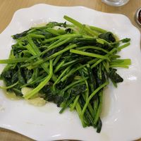 Fried spinach, $3 (plus 10% tax)  at JC Vegetarian Restaurant in Phnom Penh