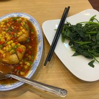 Sweet & sour tofu and sweet potato greens - yummm!  at JC Vegetarian Restaurant in Phnom Penh