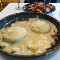 Biscuits and sausage gravy, side of potatoes   at Hark! Cafe in Plymouth