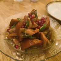 Tomatoes with pomegranate and chilly at Two Forks Hummus Shop in Malmo