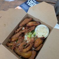 loaded fries with vegan chick'n (oyster mushrooms) at Eleven Oh 7 in Saint Michael