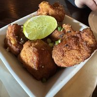 Crispy Cauliflower Bites, with General Tso’s Sauce & Lime. (Add some salt.)  at Marketplace Tavern in Litchfield