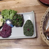 Plate of assorted starters at IVERIA in Munich