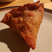 Samosa ($5). Charred flavor, plus unwanted sweetness from carrots & corn. at Curry In A Hurry in Minneapolis