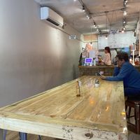 Large communal table  at Forever Coffee NYC in New York City