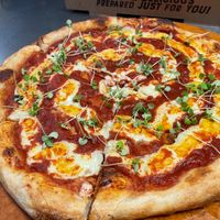 Sprouty Pie.....cashew cheese, tomato sauce with your choice of sourdough, gluten-free or spelt crust. at Lolly's Pantry in North Palm Beach