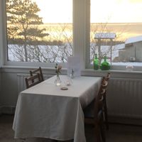 Vårt bord med utsikt mot Danmark  at Tea Room Kullaberg - Pop Up in Hoeganaes