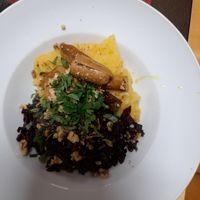 Yellow potato mash, sausage thingies, brown cabbage and walnuts at Paradies Naturkost in Vienna