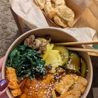 customized rice bowl with two different types of tofu; vegan mandu at Fat Baby in Aachen