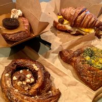 Caramel cronut, breakfast sandwich, cheese danish, and hazelnut snail at Le Petit Monstre in Brooklyn