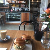 Plant based sliders, scramble, bacon, spinach, soft brioche buns, SCRUMPTIOUS plus delish oat latte  at The Old Garage in Camberwell