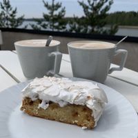Apple tart with vegan meringue & oat lattes. at Café Adjutant in Helsinki