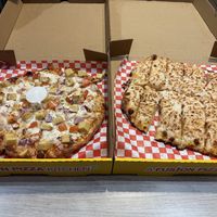 Butter chicken pizza and cheesy bread   at Pizza Twist in Sacramento