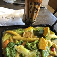 Pumpkin tofu curry and brown sugar boba tea   at Vegan Deadly Sins in Sacramento