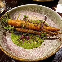 Roast heirloom carrots and carrot top pesto at INDU Dining in Sydney
