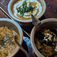 Daal, jackfruit curry, and pineapple curry at INDU Dining in Sydney