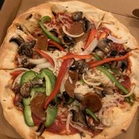 Pepperoni pizza with peppers, mushrooms, and extra cheese  at Pizza Loko in Washington