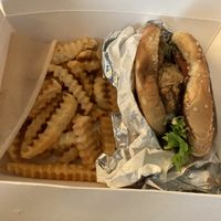 Fried mushroom burger with fries at Dee's Vegan To-Go in Charlotte