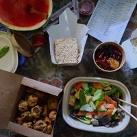 Watermelon first! Haha then feast! at Cozy Wok in Oakland