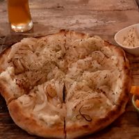 Onion pizza at Layla Restaurant Plants & Mushrooms in Puerto Morelos