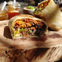 Scrambled tofu breakfast burrito with sunflower sour cream at Rústica in San Miguel De Allende