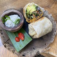 Breakfast burrito (all day) with sesame cream  at Rústica in San Miguel De Allende