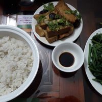 Rice with tofu and mushrooms, steamed greens and stir fried mushrooms. at Thien Tam in Lao Cai
