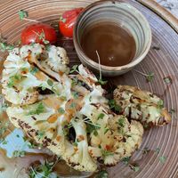 And amazing backed cauliflower  - aroma of real organic garden  mixed with classic bat vegan barbecue sauce  at Organic Life in Chisinau